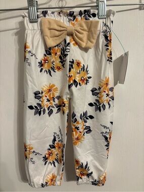 White Floral Baby Pants with yellow Bow